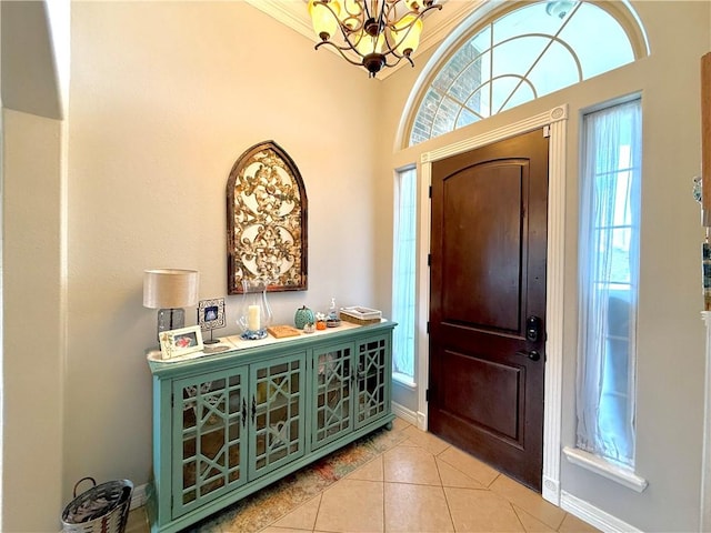 6717 Battery Park Ct, Corpus Christi, TX 78414 - foyer featuring plenty of natural light, a chandelier, and light tile patterned floors