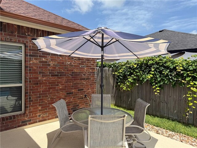 6717 Battery Park Ct, Corpus Christi, TX 78414 - view of patio featuring outdoor dining area