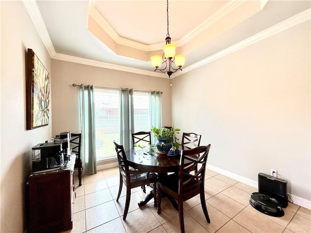 6717 Battery Park Ct, Corpus Christi, TX 78414 - dining space with a raised ceiling, a chandelier, light tile patterned floors, and ornamental molding