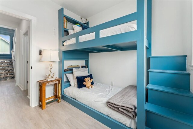 bedroom featuring wood finished floors