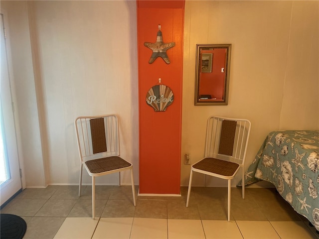 living area featuring tile patterned flooring