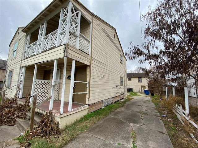 exterior space featuring a balcony