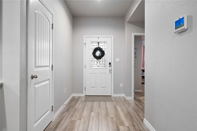 7218 Tristan, Corpus Christi, TX 78414 - foyer entrance with light wood-style flooring and baseboards