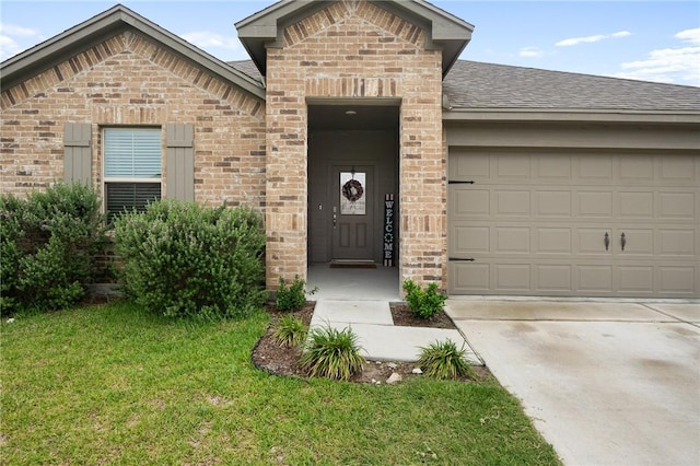 7218 Tristan, Corpus Christi, TX 78414 - view of front of house featuring brick siding, an attached garage, concrete driveway, roof with shingles, and a front lawn