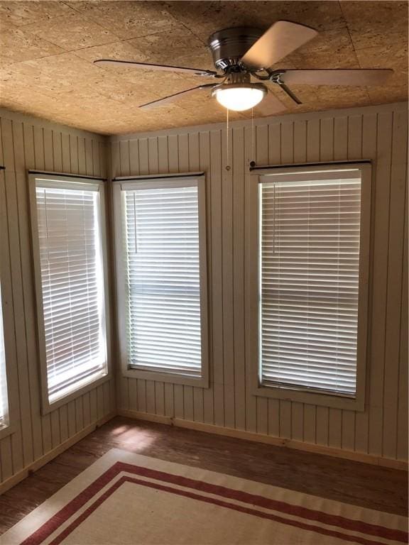 interior space featuring ceiling fan and hardwood / wood-style floors