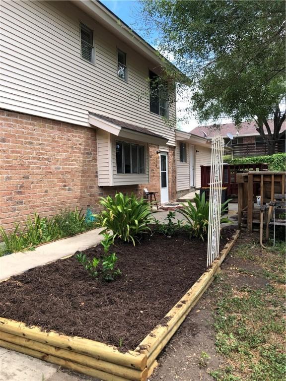 back of property with a patio