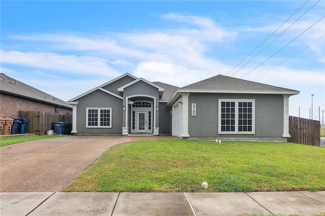 6705 Empire State Dr, Corpus Christi, TX 78414 - ranch-style home with stucco siding, french doors, and roof with shingles