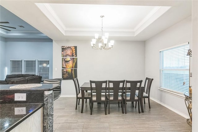 6705 Empire State Dr, Corpus Christi, TX 78414 - dining area featuring a raised ceiling, a chandelier, and crown molding
