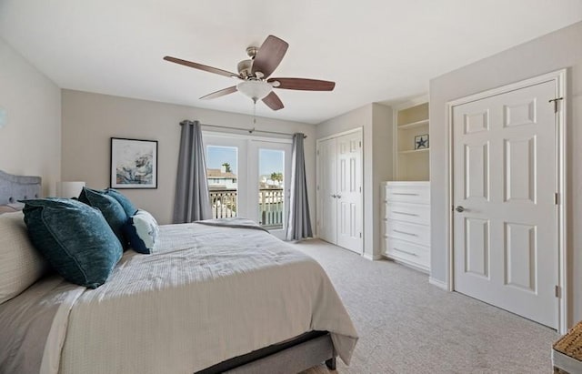 bedroom with a ceiling fan and light colored carpet