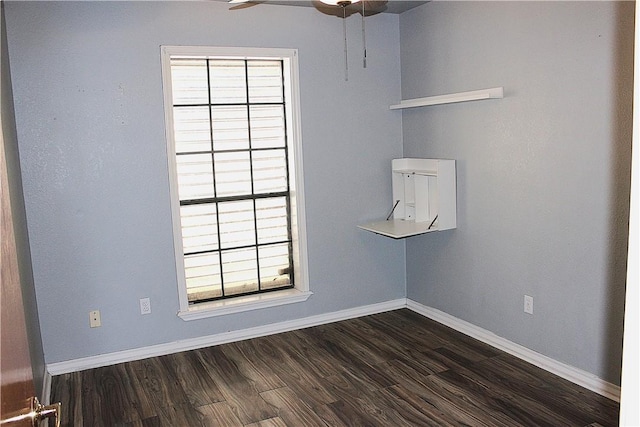 4125 Rapids Dr, Corpus Christi, TX 78410 - unfurnished room with dark wood-style floors and a ceiling fan