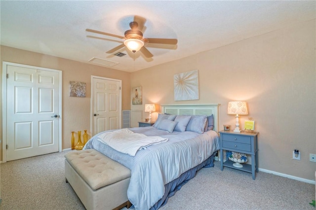 carpeted bedroom featuring ceiling fan