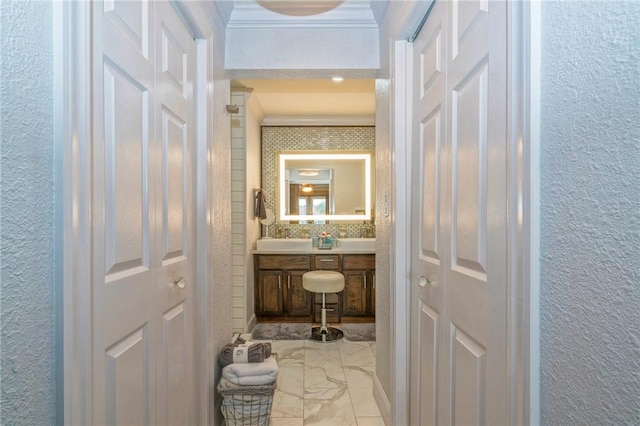 bathroom with crown molding