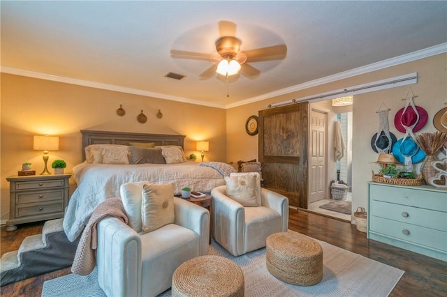 bedroom featuring dark hardwood / wood-style floors, ceiling fan, and crown molding