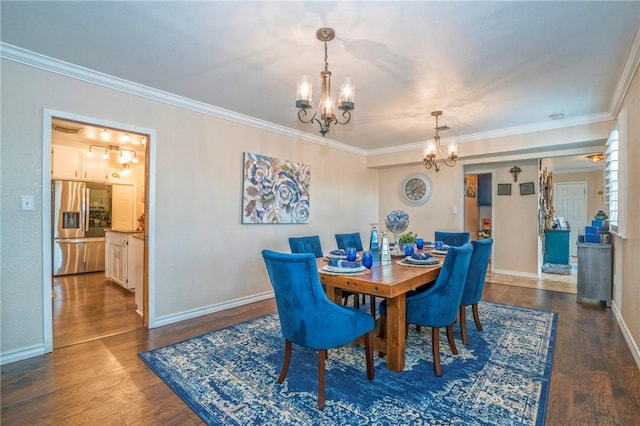 dining area with a notable chandelier, dark hardwood / wood-style floors, and crown molding