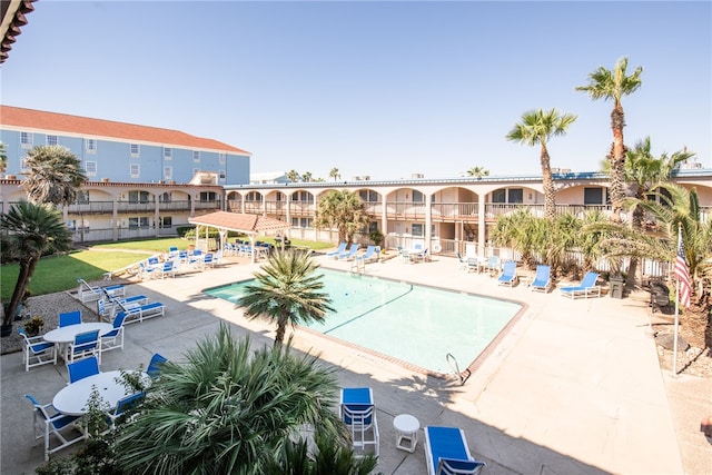 view of swimming pool featuring a patio area