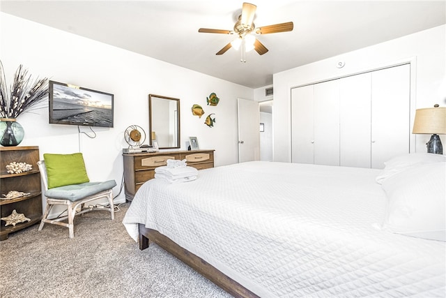 bedroom with a closet, carpet, and ceiling fan