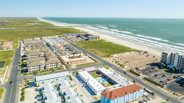 bird's eye view featuring a beach view and a water view