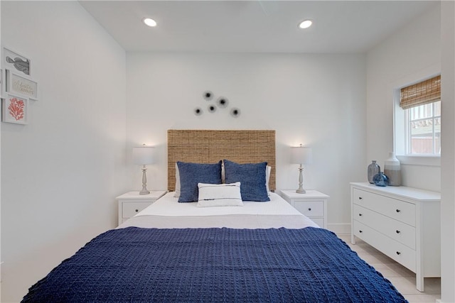 bedroom featuring light tile patterned floors