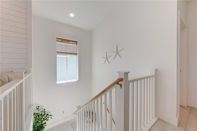 hallway featuring light tile patterned floors