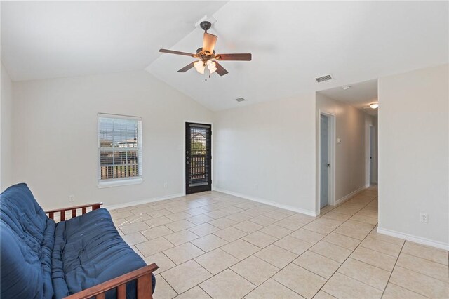 410 Knickerbocker St, Corpus Christi, TX 78418 - unfurnished room featuring ceiling fan, light tile patterned floors, lofted ceiling, and baseboards