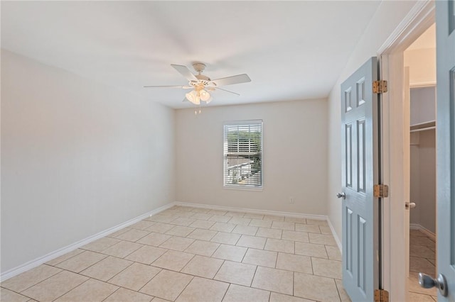 410 Knickerbocker St, Corpus Christi, TX 78418 - unfurnished room with a ceiling fan, light tile patterned floors, and baseboards