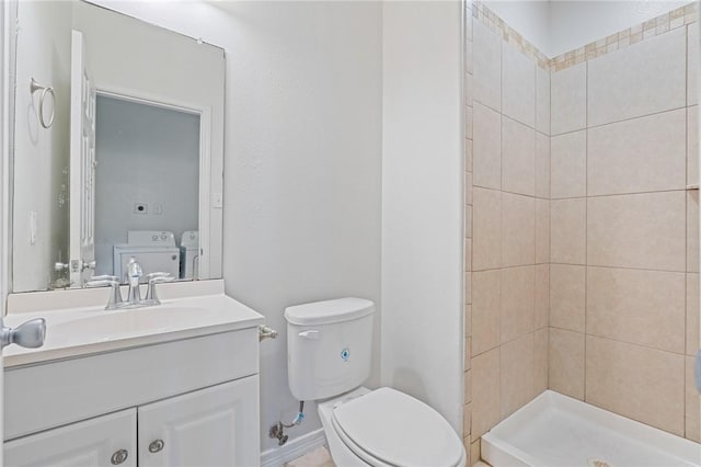410 Knickerbocker St, Corpus Christi, TX 78418 - full bath with washer and dryer, toilet, vanity, and tiled shower