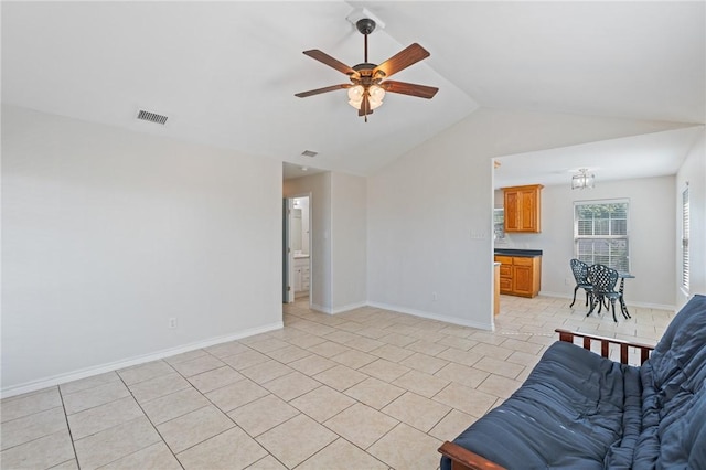 410 Knickerbocker St, Corpus Christi, TX 78418 - living room with lofted ceiling, ceiling fan, light tile patterned flooring, and baseboards