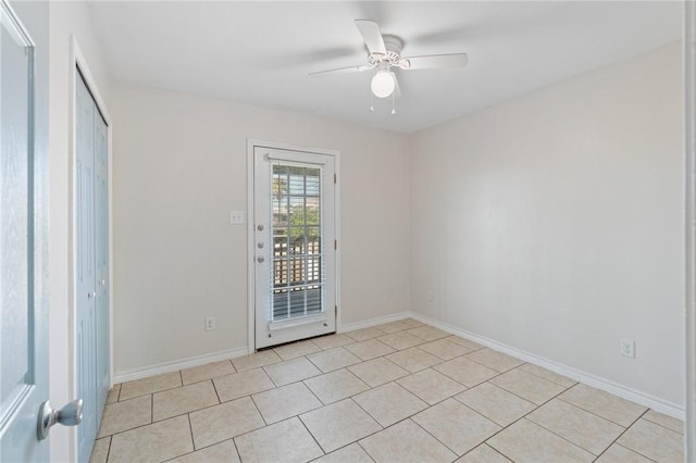 410 Knickerbocker St, Corpus Christi, TX 78418 - unfurnished room featuring a ceiling fan, light tile patterned floors, and baseboards