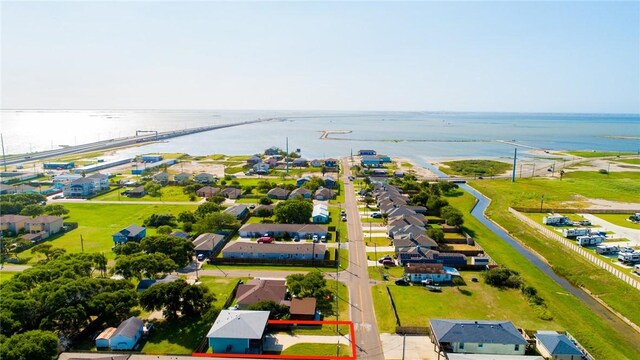 410 Knickerbocker St, Corpus Christi, TX 78418 - aerial view of property and surrounding area with a nearby body of water and property parcel outlined