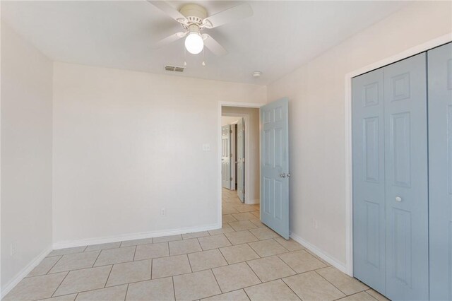 410 Knickerbocker St, Corpus Christi, TX 78418 - spare room with ceiling fan, baseboards, and light tile patterned flooring