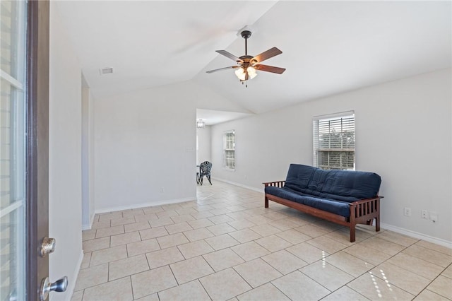 410 Knickerbocker St, Corpus Christi, TX 78418 - living area with a ceiling fan, lofted ceiling, light tile patterned flooring, and baseboards