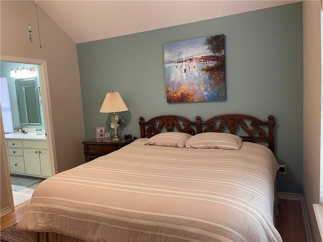 5413 Fisher Cir, Corpus Christi, TX 78413 - bedroom with vaulted ceiling and ensuite bathroom