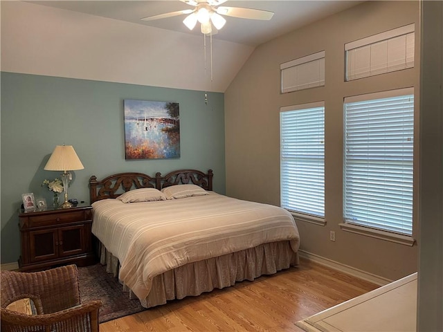 5413 Fisher Cir, Corpus Christi, TX 78413 - bedroom with light wood-style flooring, vaulted ceiling, and ceiling fan
