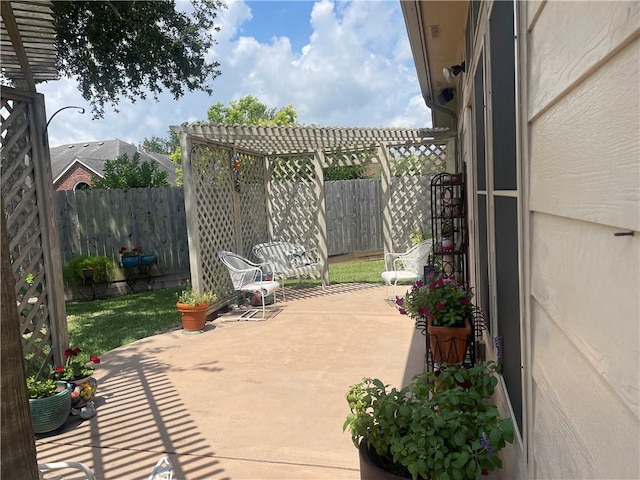 5413 Fisher Cir, Corpus Christi, TX 78413 - fenced backyard featuring a pergola and a patio