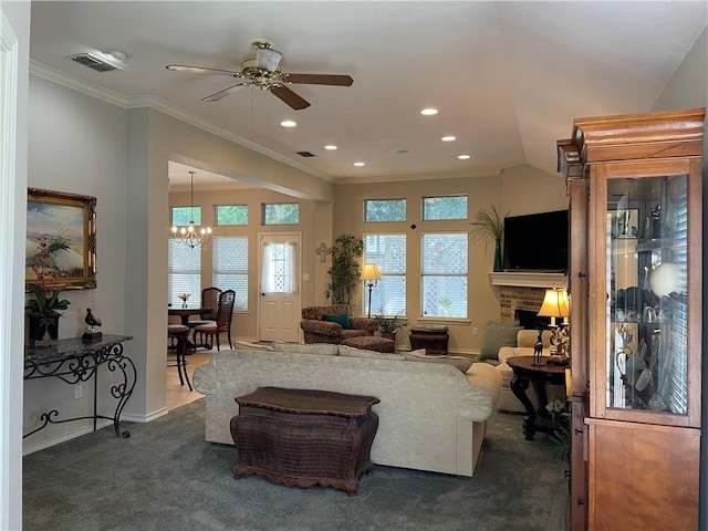 5413 Fisher Cir, Corpus Christi, TX 78413 - living room with dark carpet, a chandelier, crown molding, a ceiling fan, and recessed lighting