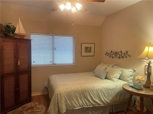 5413 Fisher Cir, Corpus Christi, TX 78413 - bedroom featuring wood finished floors, lofted ceiling, and ceiling fan