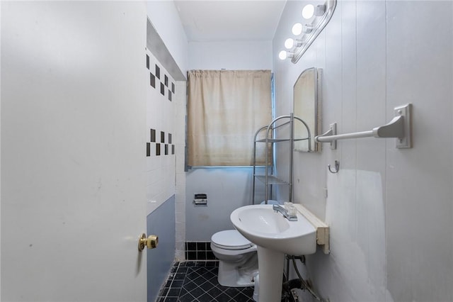 3730 Lincoln St, Corpus Christi, TX 78415 - half bathroom with tile patterned flooring and toilet