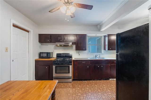 3730 Lincoln St, Corpus Christi, TX 78415 - kitchen featuring black appliances, under cabinet range hood, brick patterned flooring, ceiling fan, and dark brown cabinetry