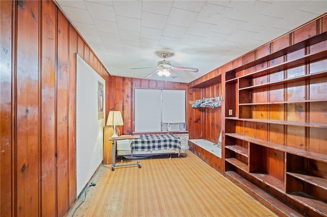 3730 Lincoln St, Corpus Christi, TX 78415 - sitting room featuring ceiling fan and wooden walls