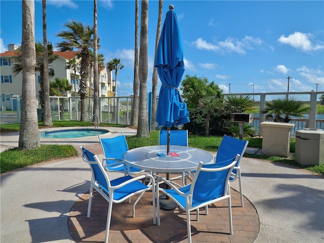 view of patio featuring a swimming pool