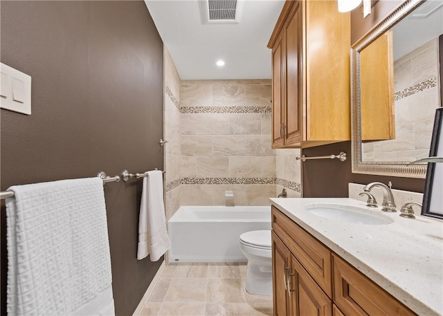 6031 Lost Creek Dr, Corpus Christi, TX 78413 - full bath with toilet, visible vents, baseboards, recessed lighting, and vanity