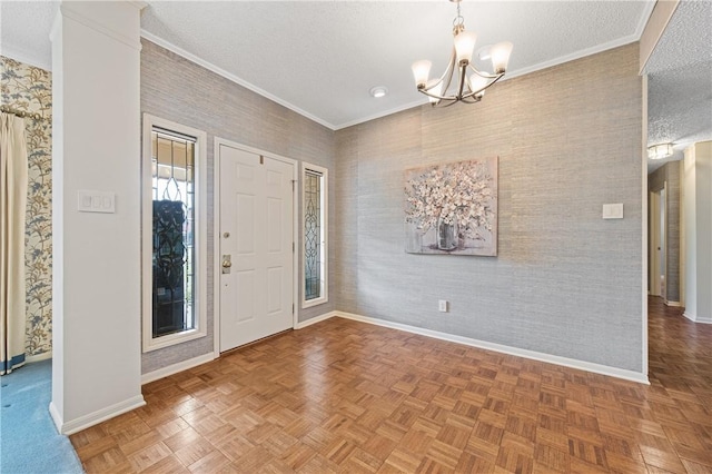 6031 Lost Creek Dr, Corpus Christi, TX 78413 - entrance foyer with baseboards, ornamental molding, wallpapered walls, and an inviting chandelier