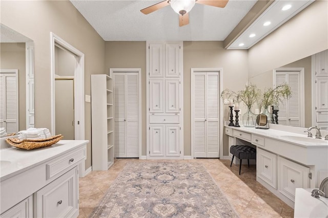 6031 Lost Creek Dr, Corpus Christi, TX 78413 - bathroom with tile patterned floors, recessed lighting, a closet, ceiling fan, and vanity
