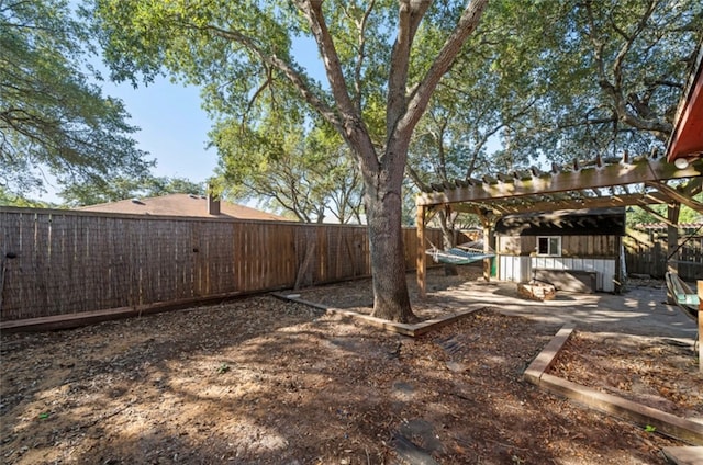 view of yard with a pergola