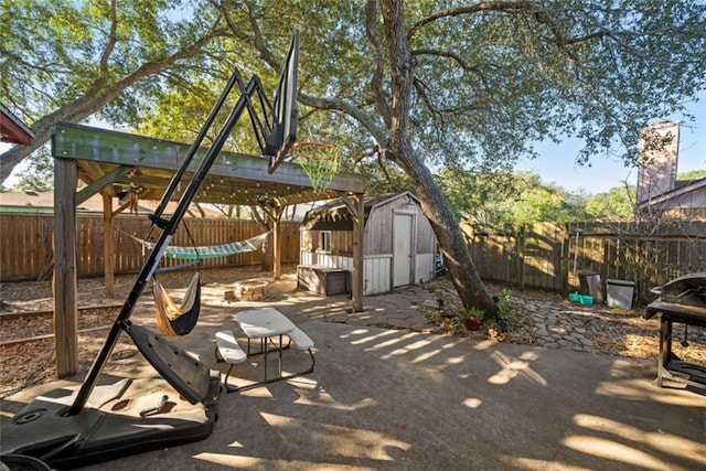 view of patio / terrace featuring a storage shed