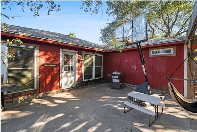 rear view of house with a patio