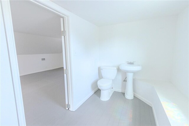 4338 Cottage St, Corpus Christi, TX 78415 - bathroom with toilet and baseboards