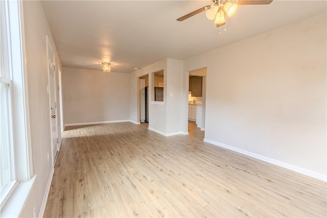 4338 Cottage St, Corpus Christi, TX 78415 - spare room featuring light wood-style floors, ceiling fan, and baseboards