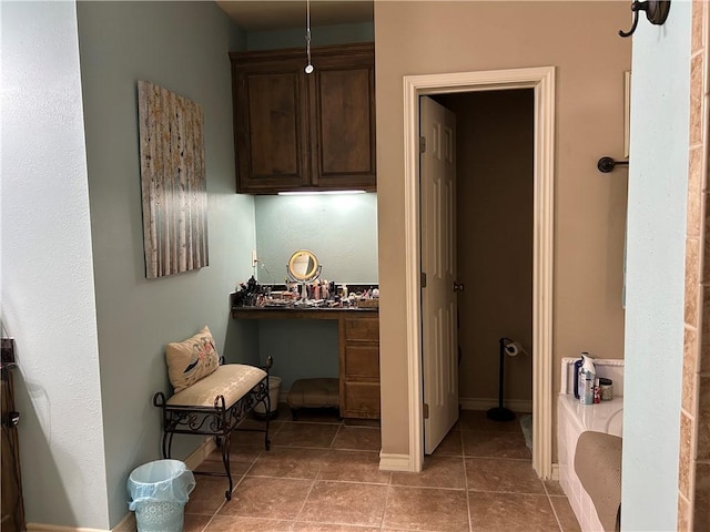 1645 W Manor Dr W, Corpus Christi, TX 78412 - full bathroom with tile patterned floors and baseboards