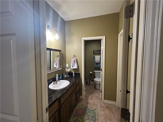 1645 W Manor Dr W, Corpus Christi, TX 78412 - bathroom featuring vanity and tile patterned floors